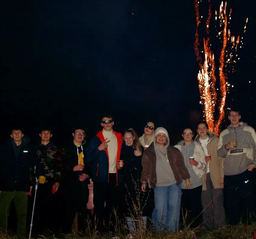 Group of young people at night